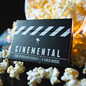 The image features a promotional setup for the "Cinemental" product, a deck of cards designed for a two-phase mentalism routine. The product is displayed with a cinematic popcorn backdrop, enhancing its magical appeal.