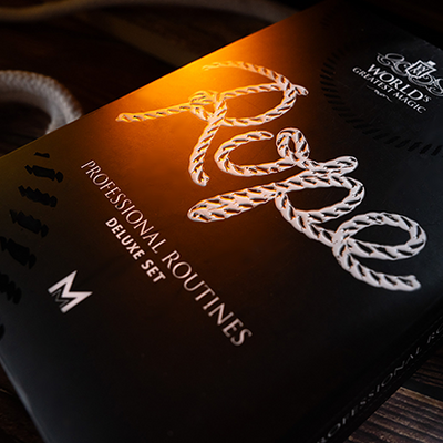 A package of 'WGM Professional Rope Tricks' by Murphy's Magic featuring a rope design on the cover, placed on a wooden surface with a rope background.